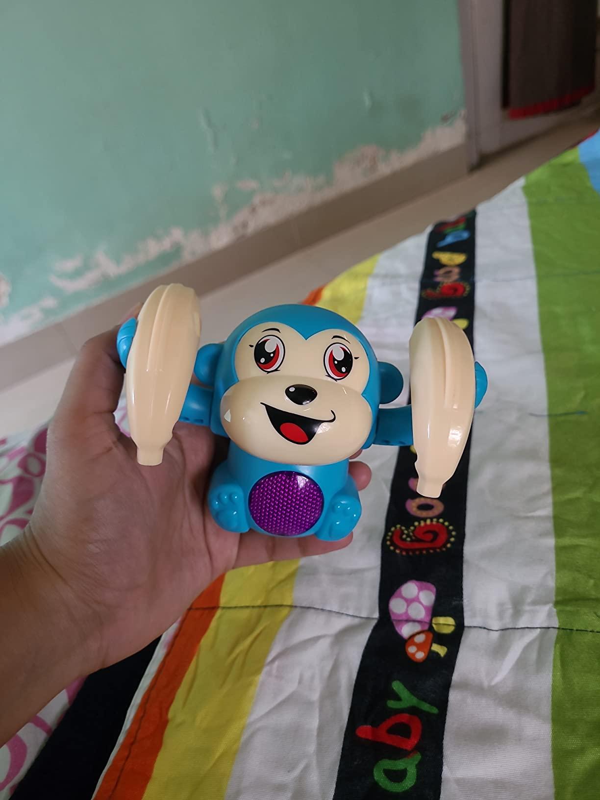 Spinning and Dancing Tumble Monkey (Rolling Doll)